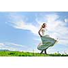 happy young beautiful bride after wedding ceremony event have fun outdoor on meadow at sunset