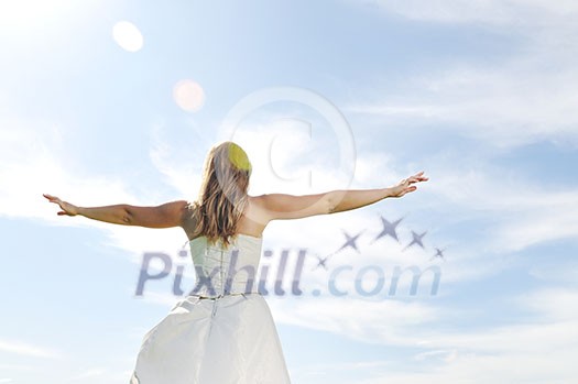 happy young beautiful bride after wedding ceremony event have fun outdoor on meadow at sunset happy young beautiful bride after wedding ceremony event have fun outdoor on meadow at sunset