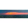 Panoramic sunset with red dramatic  sky over Atlantic Ocean in Prince Edward Island, Canada