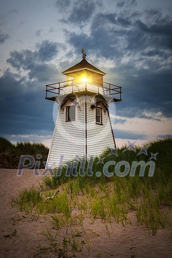 Shining light of Covehead Harbour lighthouse, Prince Edward Island, Canada