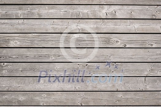 Background of old wooden weathered unpainted deck planks Background of old wooden weathered unpainted deck planks