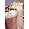 Hot chocolate and coffee latte beverages with whipped cream