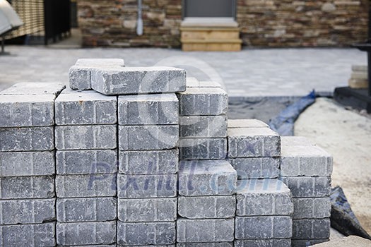 Stacks of interlocking stones for installing driveway landscaping Stacks of interlocking stones for installing driveway landscaping