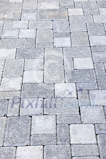 Gray interlocking paving stone driveway from above Gray interlocking paving stone driveway from above