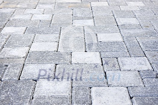 Gray interlocking paving stone driveway from above Gray interlocking paving stone driveway from above