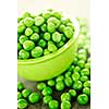 Closeup on bowl of fresh green organic green peas
