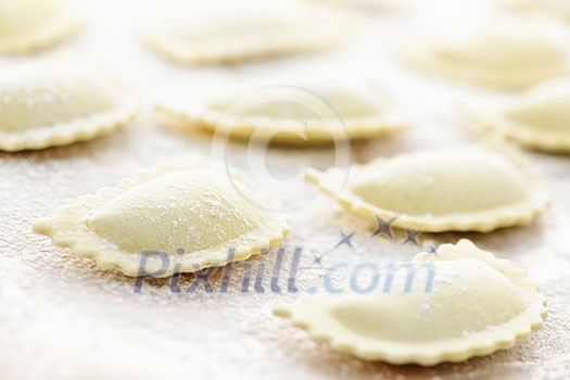 Uncooked ravioli pasta prepared and ready for cooking Uncooked ravioli pasta prepared and ready for cooking