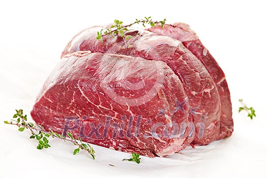 Raw beef roast tied and ready for cooking Raw beef roast tied and ready for cooking