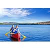 Father and daughter canoeing on Lake of Two Rivers, Ontario, Canada