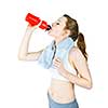 Happy fit young woman drinking from water bottle after workout