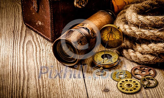 Vintage grunge still life. Antique items on wooden table. Travel geography concept.