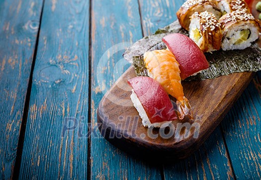 Sushi set on a wooden tray Sushi set on a wooden tray