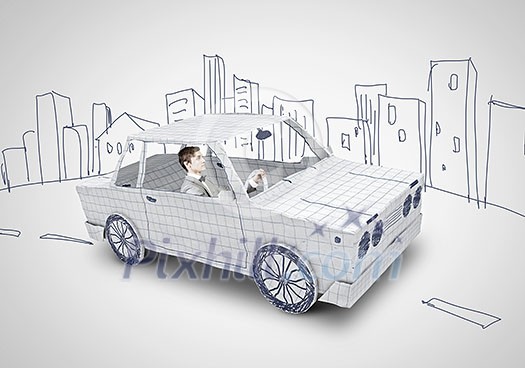 Young man driving car made of sheet of paper Young man driving car made of sheet of paper