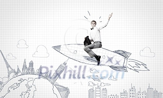 Young businessman flying in sky on drawn rocket