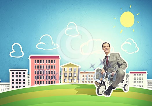 Young handsome businessman riding three wheeled bicycle