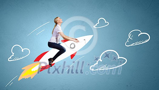 Young girl flying on rocket against drawn background Young girl flying on rocket against drawn background