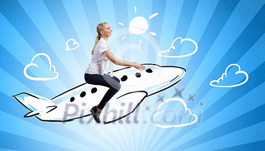 Young woman riding drawn airplane flying in air Young woman riding drawn airplane flying in air