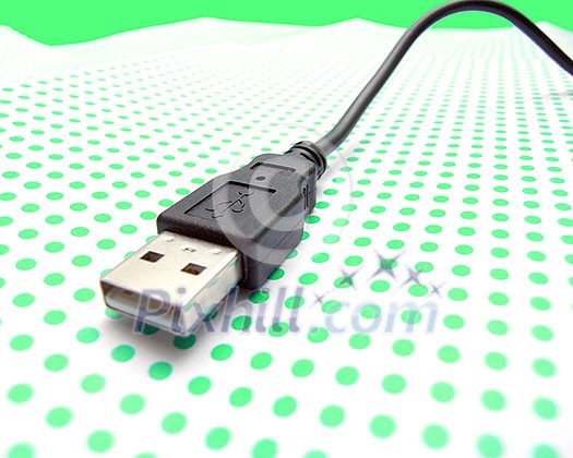 usb cable on dotted background usb cable on dotted background