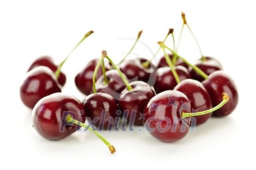 Bunch of fresh cherries on white background