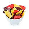 Bowl of colorful tortilla chips isolated on white background