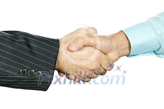 Closeup of two businessmen shaking hands in agreement Closeup of two businessmen shaking hands in agreement