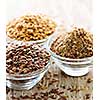 Bowls of whole and ground flax seed or linseed