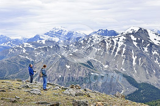 Hikers enjoying scenic Canadian Rocky Mountains view in Jasper National Park