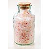 Pink bath salts in a glass jar