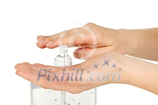 Female hands using hand sanitizer gel pump dispenser Female hands using hand sanitizer gel pump dispenser