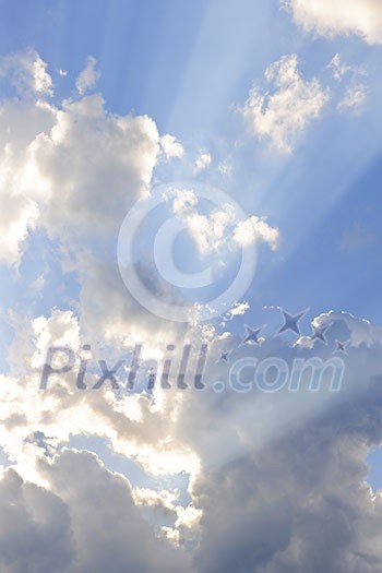 Background of blue sky with sun rays and clouds