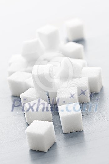 Close up of many white sugar cubes Close up of many white sugar cubes