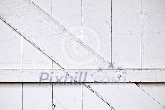 Background of old wooden barn door painted white