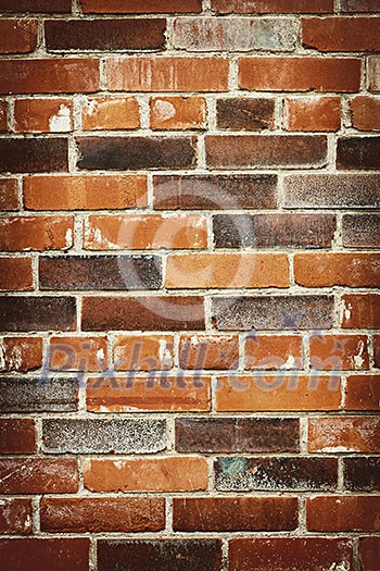 Red and brown brick background of grungy wall