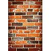 Red and brown brick background of grungy wall