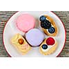 Dessert plate with french macarons and pastries