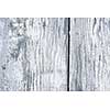 Textured background of distressed rustic wood with peeling blue and white paint