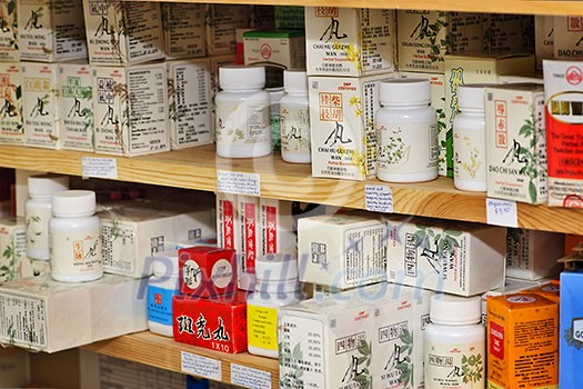 Various traditional chinese medicine products on shelves