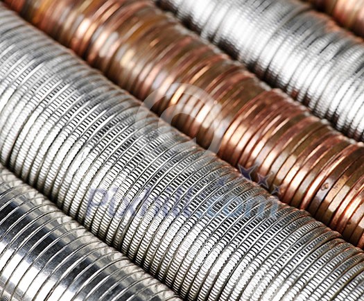 Background of penny nickel dime and quarter stacked coins Background of penny nickel dime and quarter stacked coins