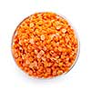Bowl of uncooked red lentils from above isolated on white background