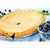 Whole baked blueberry pie with fresh  blueberries