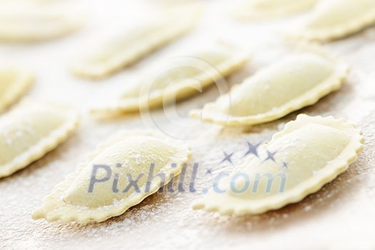 Uncooked ravioli pasta prepared and ready for cooking Uncooked ravioli pasta prepared and ready for cooking