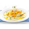 Gourmet squash ravioli dinner served with cheese on plate