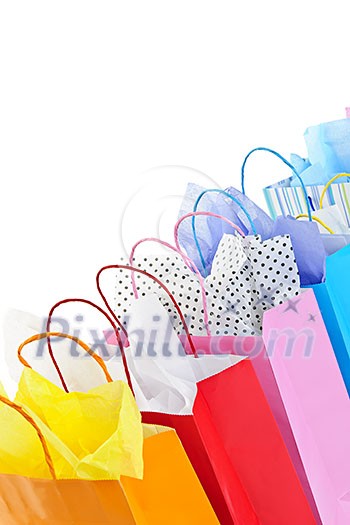 Many colorful shopping bags on white background