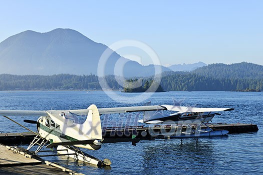 Seaplanes at dock in Tofino on Pacific coast of British Columbia, Canada