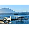 Seaplanes at dock in Tofino on Pacific coast of British Columbia, Canada