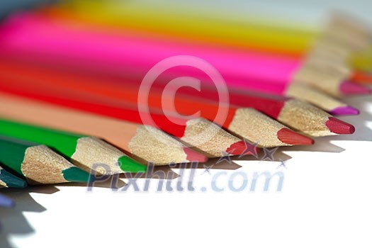 children education concept with colorful wooden pen isolated on white background