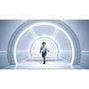 Young businessman running in futuristically designed tunnel