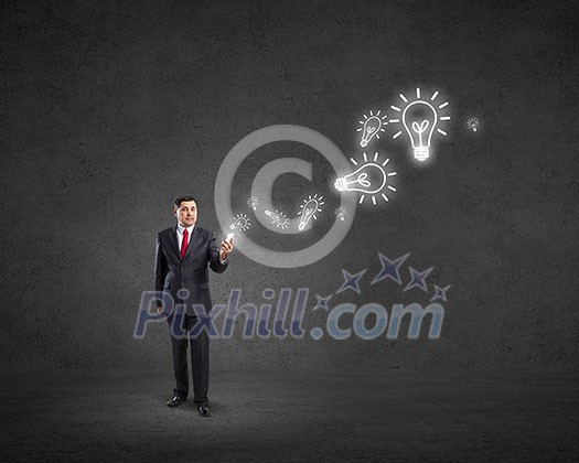Businessman using his smartphone and glowing percent sign of screen Businessman using his smartphone and glowing percent sign of screen
