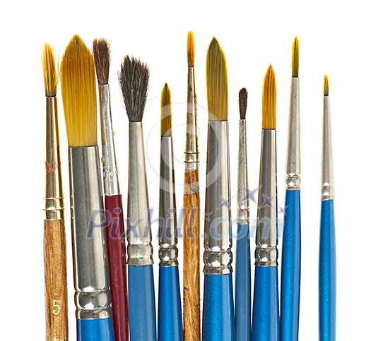 Various sizes of paintbrushes on white background Various sizes of paintbrushes on white background