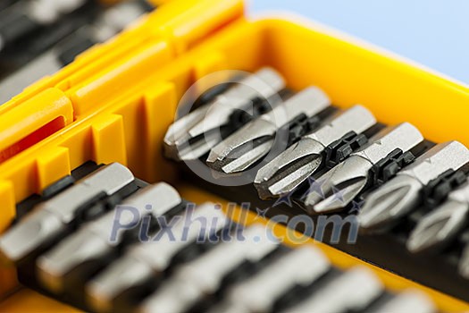 Closeup on screwdriver insert bits of various sizes